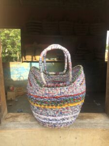 Basket made of plastic and waste fabric